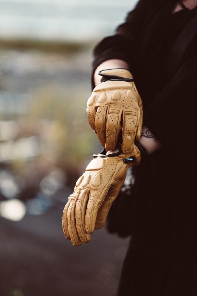 Current image: a person wearing a pair of yellow gloves